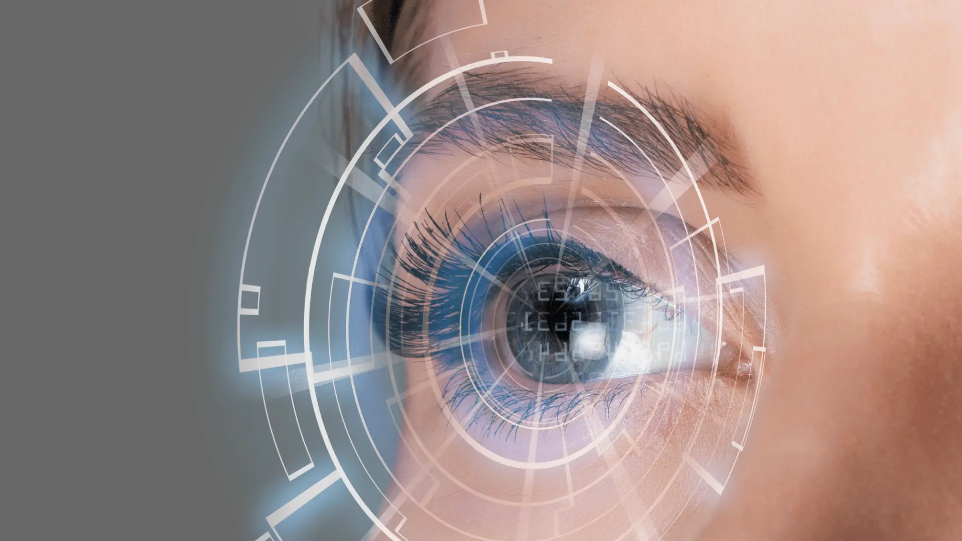A close-up of a person's eye with a digital, futuristic interface overlay, including circular graphics and geometric shapes, suggests biometric scanning or the advanced technology used by an ophthalmologist Brisbane or cornea surgeon.