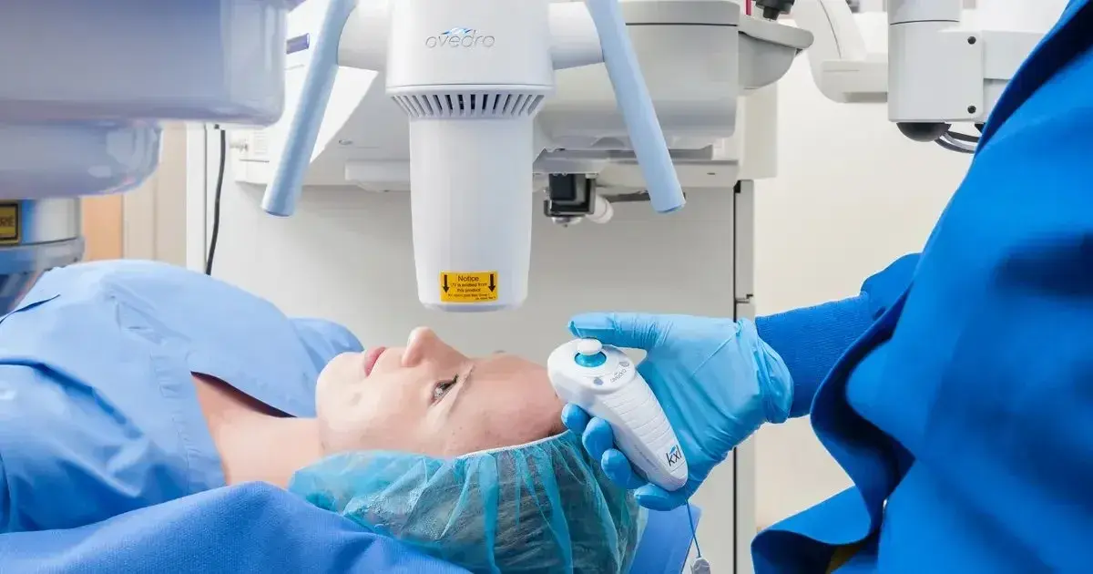 Patient undergoing cross linking treatment with medical equipment.