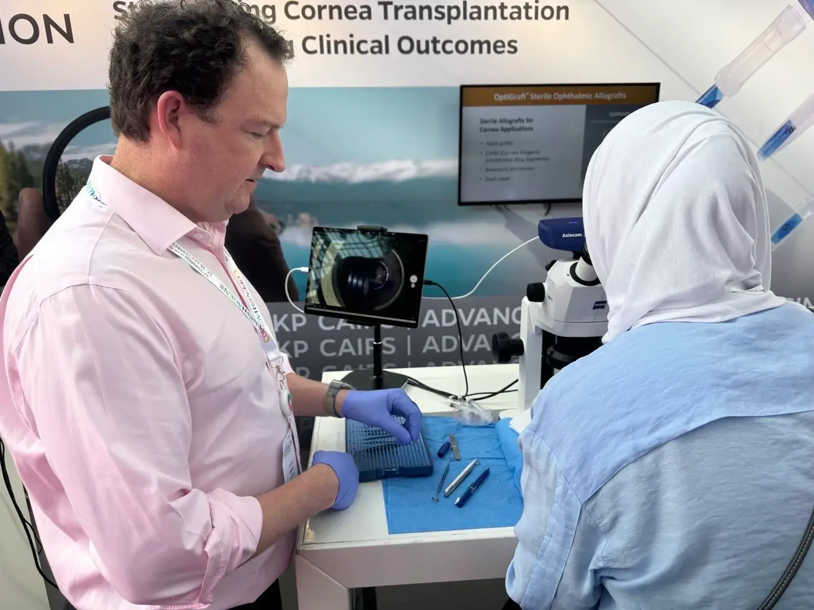 Instructor demonstrating cornea transplantation techniques at a workshop.